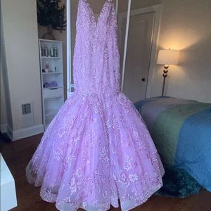This is a Tiffany Designs Pink/Lilac Mermaid Prom Dress. It has a medium train.